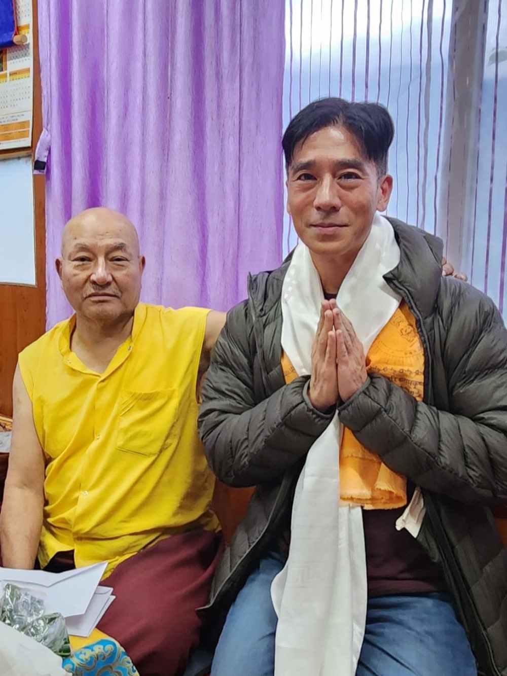 Alex with Dzogchen master Kabesa Rinpoche, wearing a white khata ceremonial scarf